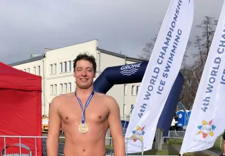 Tomasz Józefiak, a TUL student, with a bronze medal at the Ice Swimming World Championships, photo: private arch.